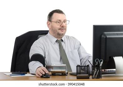 Businessperson Measures Blood Pressure By Himself During Virtual Doctor Visit. This Man Has A Telemedicine Consultation Service For The Time Of His Lunch. Horizontal Shot. 