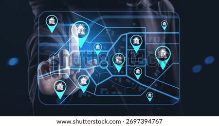 Businessperson using virtual interface with glowing blue property icons on city map background, representing real estate market search concept
