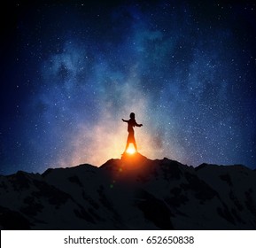Businesswoman against starry sky . Mixed media - Shutterstock ID 652650838