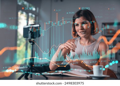 Businesswoman analyzing stock charts with a digital overlay, seated at a desk in an office. Concept of financial analysis and technology integration - Powered by Shutterstock