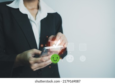 Businesswoman Assess Service Satisfaction Smile Icon By Smartphone, Corporate Care High Standard, ISO, Customer Care, Excellent Level, Quality Guaranteed In Service Of Company. The Highest Service.