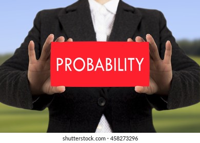 Businesswoman in a black jacket shows a card with the inscription probability. Selective focus. - Powered by Shutterstock - Get 15% off with code: PIKWIZARD15