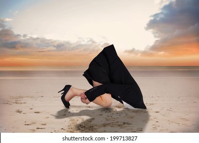Businesswoman burying her head against peaceful scene