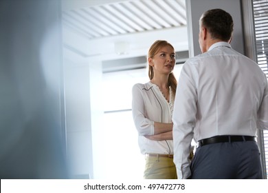 Businesswoman And Business Man Having A Very Serious Conversation In The Office 