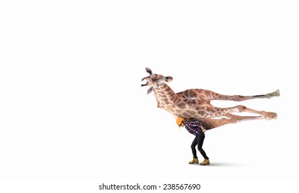 Businesswoman carrying big giraffe on her back