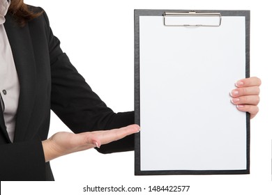 businesswoman carrying an empty clipboard with copy space