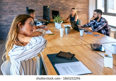 Businesswoman With Cervical Pain Massaging Her Neck