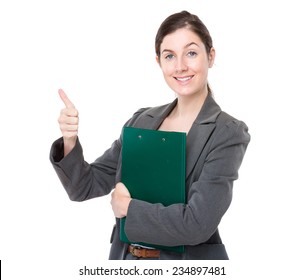 Businesswoman with clipboard and thumb up