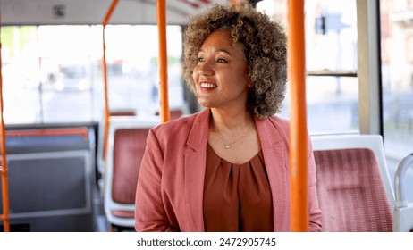 Businesswoman commuting by a bus - Powered by Shutterstock