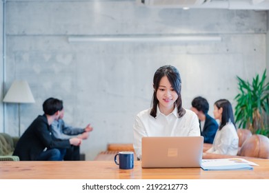 A businesswoman doing clerical work in an office - Shutterstock ID 2192212773