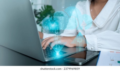 Businesswoman downloading business data from internet network showing usage of big data network and cloud computing system. - Powered by Shutterstock - Get 15% off with code: PIKWIZARD15