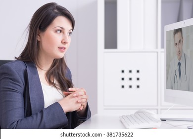 Businesswoman During Medical Consultation With Skype Doctor