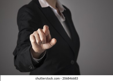 Businesswoman in front of visual touch screen. - Powered by Shutterstock