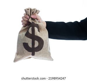 Businesswoman hand holding a money bag with dollar sign. - Powered by Shutterstock