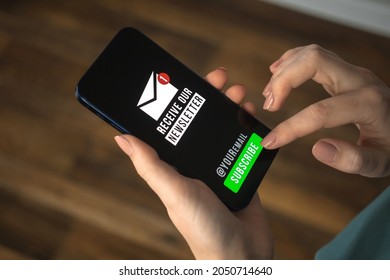 Businesswoman hand press the subscribe button to newsletter emails