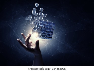 Businesswoman hand touch cube as symbol of problem solving  - Shutterstock ID 354366026