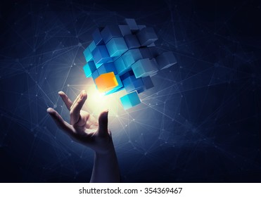 Businesswoman hand touch cube as symbol of problem solving  - Shutterstock ID 354369467
