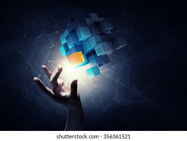 Businesswoman hand touch cube as symbol of problem solving  - Shutterstock ID 356361521