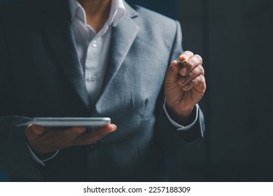 Businesswoman hand touching virtual screen, modern background concept, can put your text with icon bundle, copy space - Powered by Shutterstock