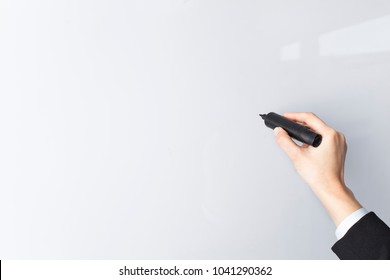 Businesswoman Hand Writing On The Whiteboard