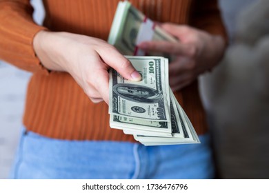 Businesswoman hands holding a money.