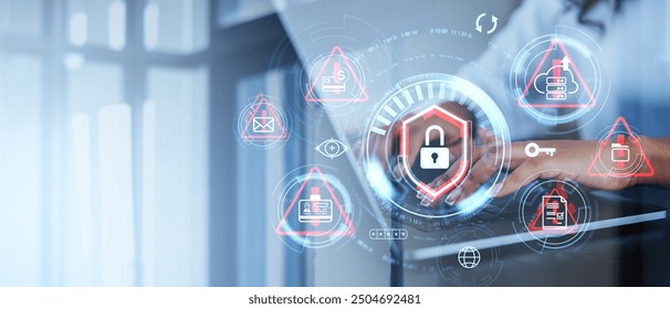 Businesswoman hands typing in computer, double exposure lock icon with system alert and threat. Bug detection, online security and cyber crime. Concept of cybersecurity and data breach