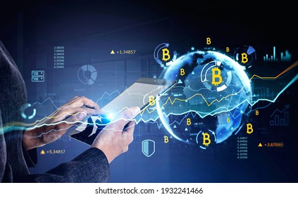 Businesswoman hands using tablet researching a business report of cryptocurrency market behaviour based on worldwide news. Business and financial success concept. World globe and charts on background