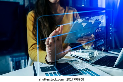 Businesswoman hands working on network and digital finance marketing chart with future technology innovation and digital transformation concept, blurred background. - Powered by Shutterstock