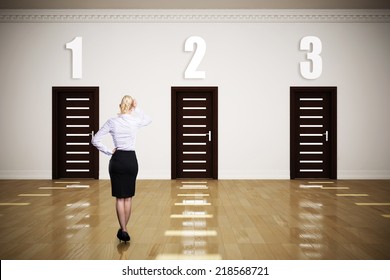 businesswoman has to choose between 3 options  - Powered by Shutterstock