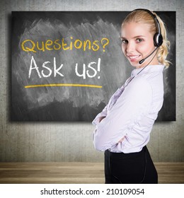 Businesswoman With Headset And A Blackboard Stating 