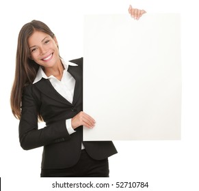 Businesswoman Holding Blank Whiteboard Sign. Casual Business Woman In Suit Is Holding Blank Billboard Placard And Showing Its Empty Copy-space. Isolated On White Background.