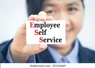 Businesswoman Holding Card With Employee Self Service (ESS) Message.