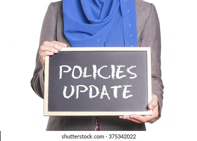 Businesswoman Holding A Chalk Board Written Policies Update