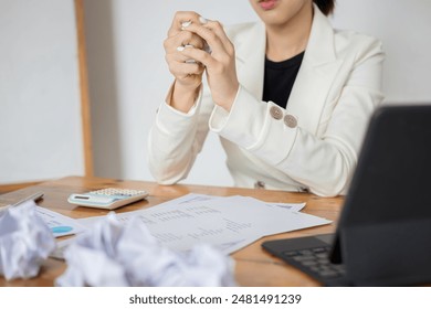 Businesswoman holding crumpled paper and strain feeling was frustrated with working failed - Powered by Shutterstock