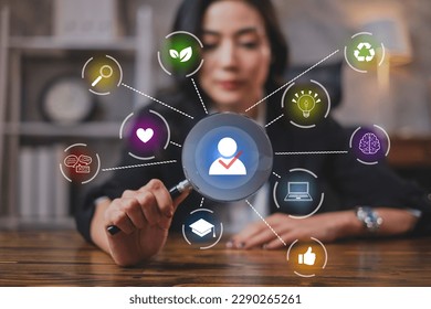 A Businesswoman or Human resources HR is searching for a right person for a job position. Concept of hiring, selection, interview, recruitment, soft skill and hard skill. Company employee match.  - Powered by Shutterstock