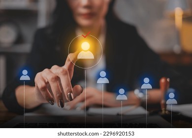 A Businesswoman or Human resources HR is searching for a right person for a job position. Concept of hiring, selection, interview, recruitment, soft skill and hard skill. Company employee match.
