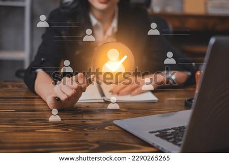 A Businesswoman or Human resources HR is searching for a right person for a job position. Concept of hiring, selection, interview, recruitment, soft skill and hard skill. Company employee match. 