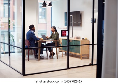 Businesswoman Interviewing Male Job Candidate In Meeting Room - Shutterstock ID 1459982417