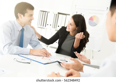 Businesswoman Listening And Paying Attention To Her Colleague In The Meeting