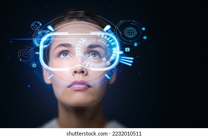 Businesswoman look up portrait in vr glasses hologram, glowing virtual headset with connection, earth sphere and lines. Concept of metaverse - Powered by Shutterstock