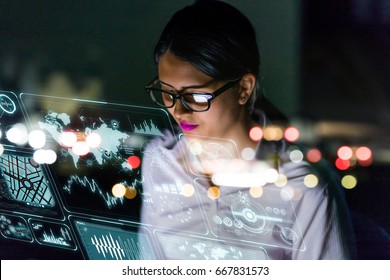 Businesswoman Looking At Futuristic Interface Screen.