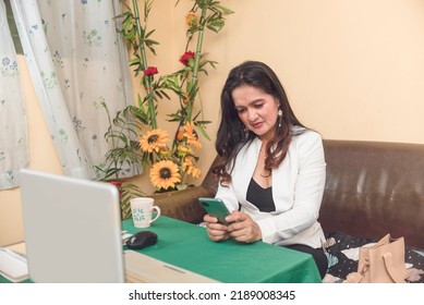 A Businesswoman Looking For An Important Supplier's Phone Number To Call And Confirm An Online Meeting.