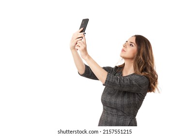 Businesswoman Looking For Signal, In A Place Of Bad Cell Reception, Isolated On White