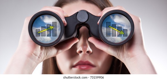A businesswoman looking through binoculars, seeing conflicting trends in earnings prediction, can be used for business vision or business prediction concept