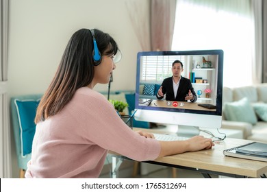 Businesswoman Making Video Call To Business Partner Using Computer. Close-up Rear View Of Young Woman Having Discussion With Corporate Client. Remote Job Interview, Consultation, Human Resources