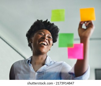 Businesswoman meeting at office and use post it notes to share idea. Brainstorming concept. Sticky note on glass wall. - Powered by Shutterstock