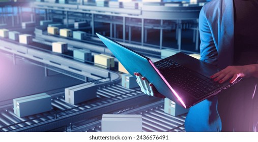 Businesswoman near conveyor belt. Production line with boxes. Businesswoman monitors production via computer. Cropped lady and conveyor belt. Industrial plant with multi-tier conveyor