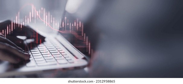 Businesswoman in a office analyzes complex crisis market data on a dlaptop. Detailed financial graphs indicate a high-pressure, data driven work environment, forex background - Powered by Shutterstock