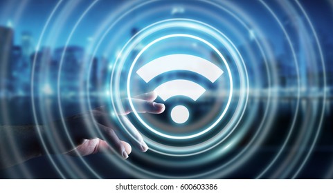 Businesswoman on blurred background using free wifi hotspot interface 3D rendering