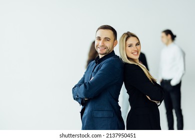 Businesswoman On The Foreground Of His Collegues